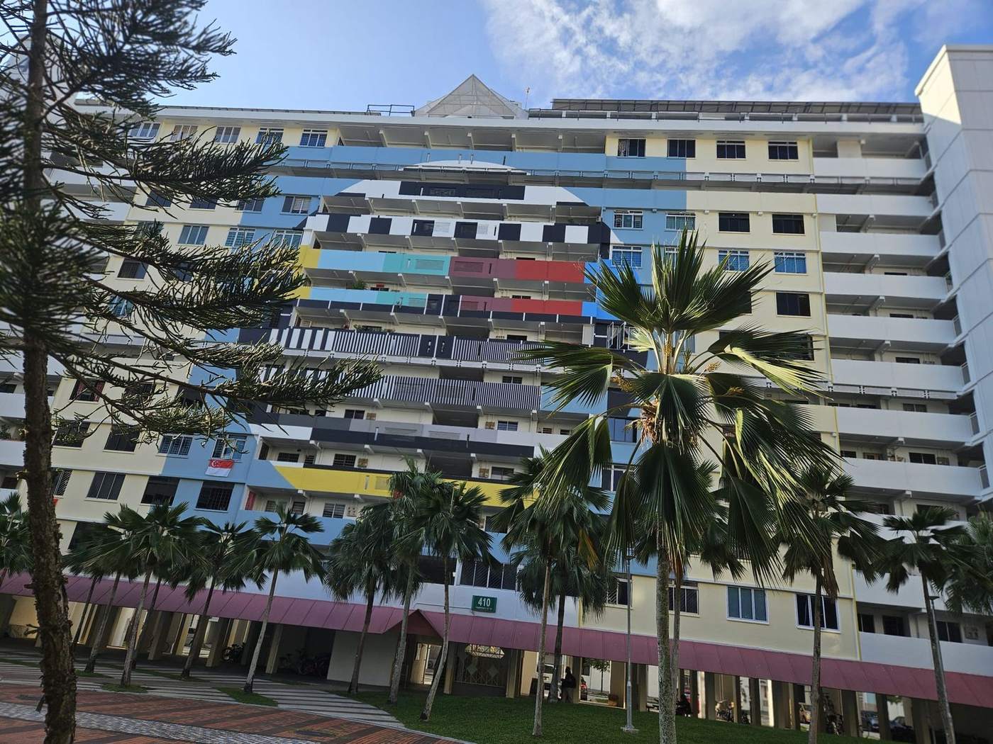 Colourful mural-painted HDB block 410 in Tampines — everyday Singapore public housing